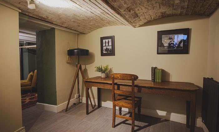 On the lower ground floor, where the beer cellar used to be, you'll find space for studying, or additional beds for larger groups.